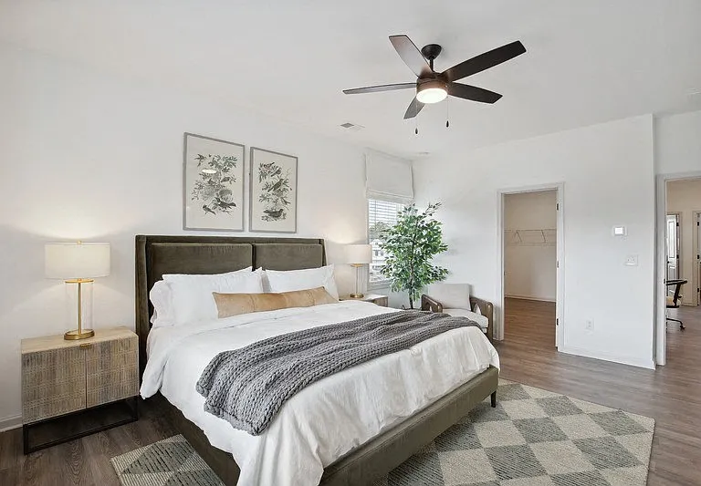 "Serene primary suite with a plush king bed, refined finishes, and calming greeneryyour private retreat for rest and relaxation."