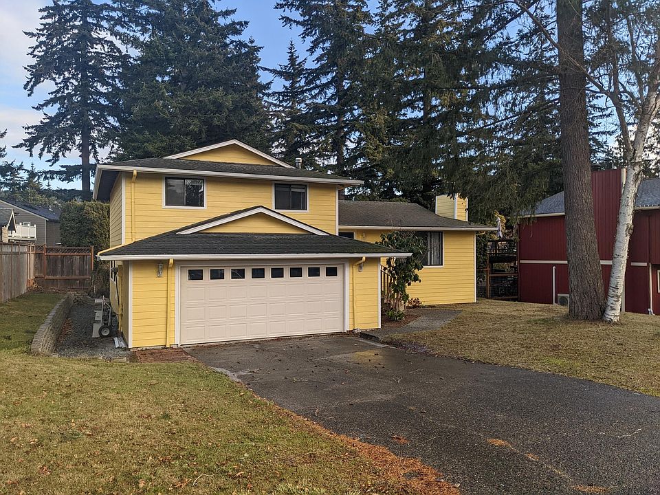 Front of house and north side yard