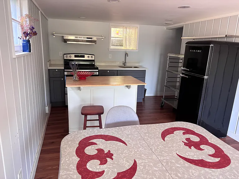 Dining and kitchen area (all furniture in photos can stay as requested)
