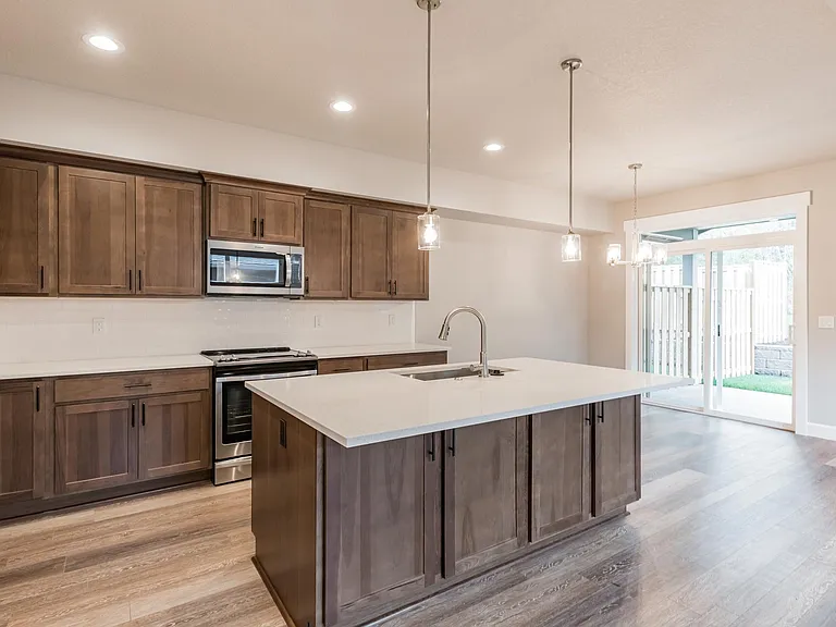 Kitchen W/ Backyard entrance