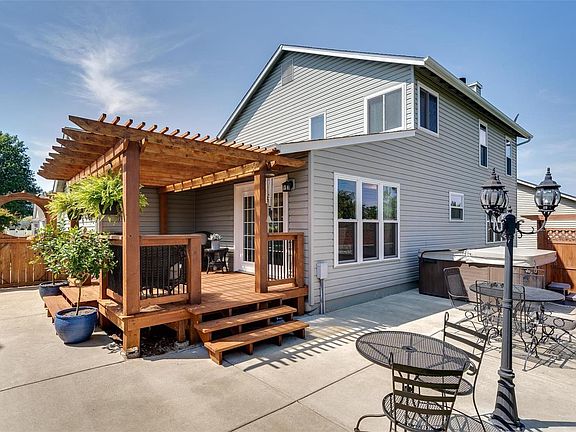 Enjoy this perfect outdoor space. There's something for everyone with the shaded pergola deck, over-sized patio and hot tub with privacy fence. Both beautiful French doors open to extend your kitchen entertainment space outdoors and brings the outdoors in... like all the trendy restaurants!