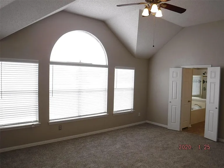 NICE SIZED MASTER BEDROOM WITH WALK IN CLOSET AND HIS- HER VANITIES IN BATHROOM.