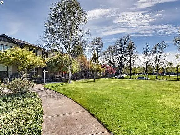 Sidewalk to Townhouses and green space.