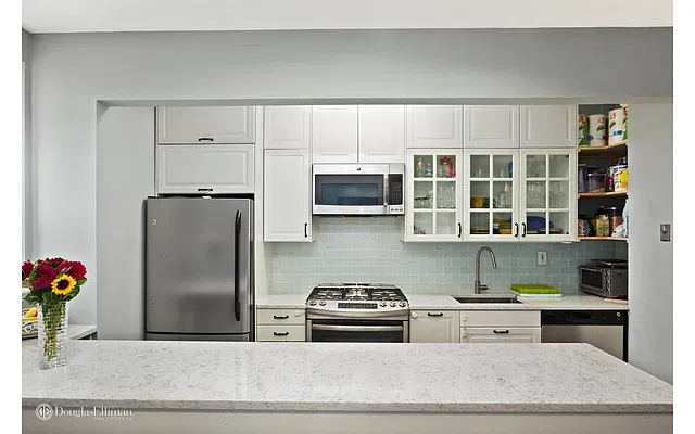 Sold by Douglas Elliman | media 13