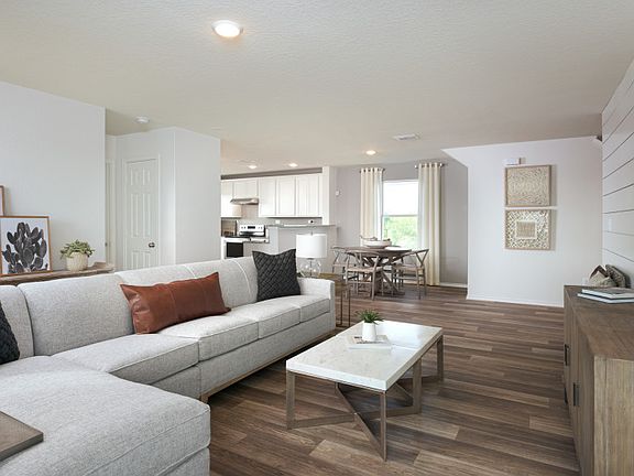 Gathering room with view of kitchen