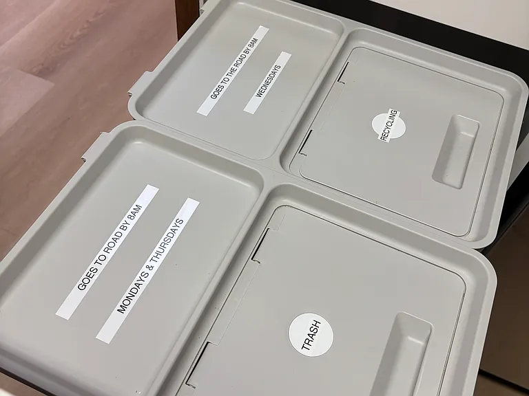 Trash and recycling bins.