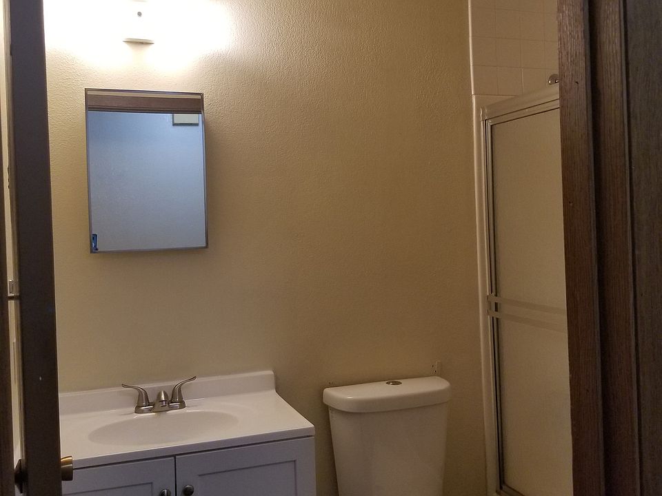 Partial bathroom with cabinet from apt 6, reverse of apt 5