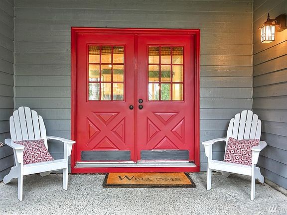 French doors and covered front porch welcome you home.