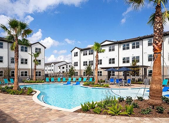 Sparkling Pool with Outdoor Grilling Space
