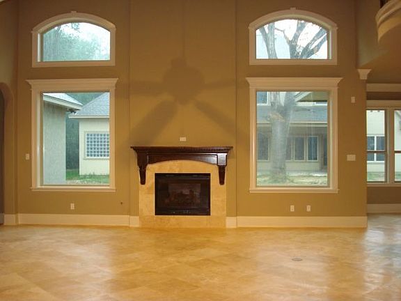 Two story Great Room with architectural rafter detailing.
