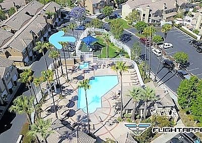 Overview of the pool, club house & tot-lot.