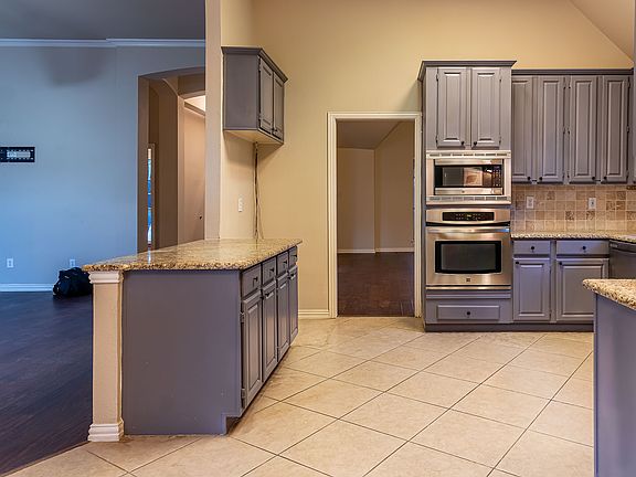 5th image of 9611 E Oaks Ln
