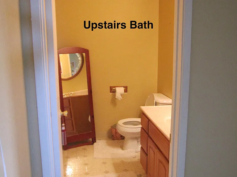 Upstairs 1/2 bath next to kitchen