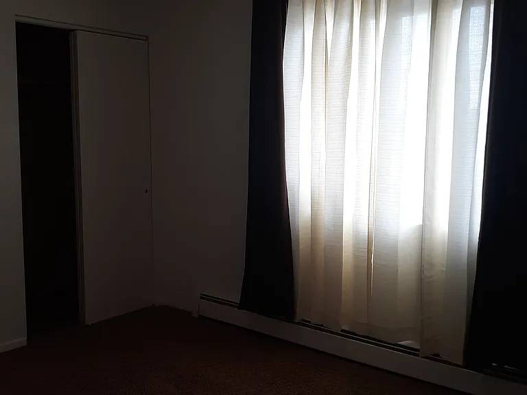 Smaller front bedroom with closet