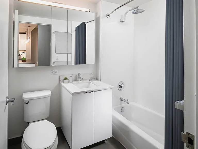 Renovated Package I bath with quartz stone countertop