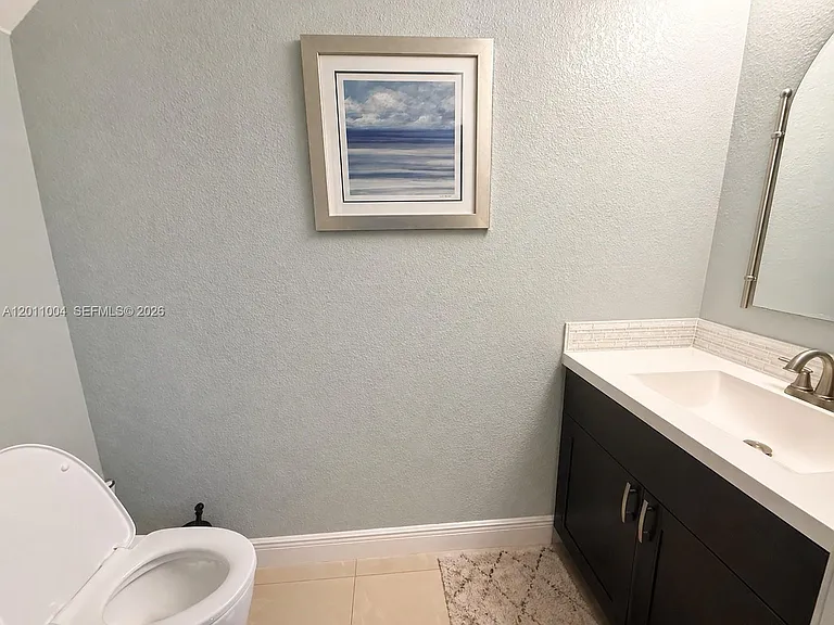 10290 SW 24th Ct — Photo 16