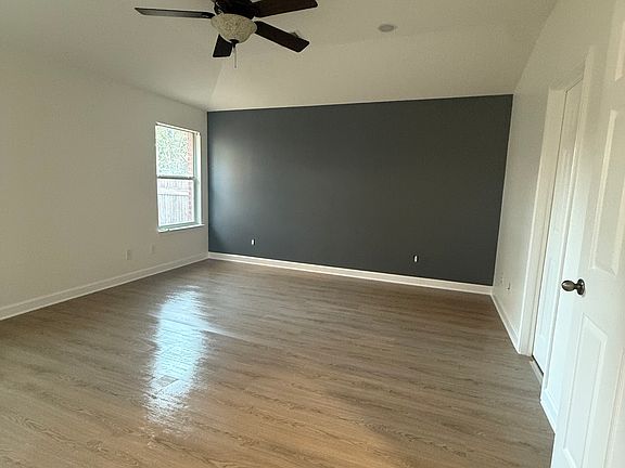 Master bed with brand new paint and LVP flooring