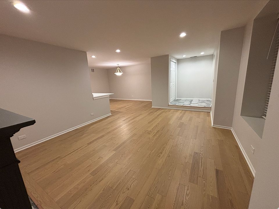 living room looking at entry and dining area