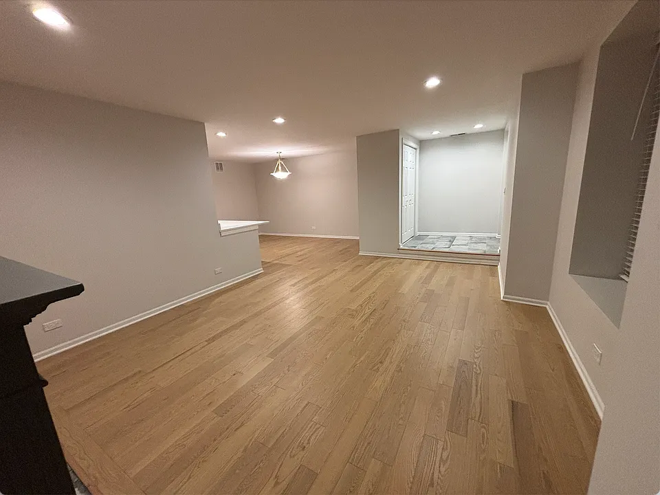 living room looking at entry and dining area