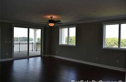 Spacious Living Room
						:
						Open concept living, dining and kitchen.
Wide plank distressed wood flooring.