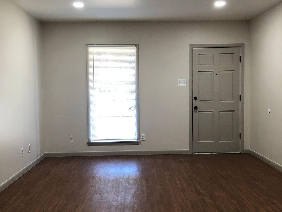 living room, new fan, new canister lights, new paint