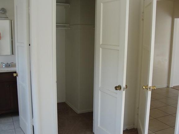 Walk in closet in bedroom