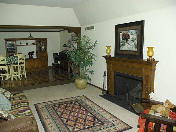 SUNKEN LIVING ROOM WITH FIREPLACE