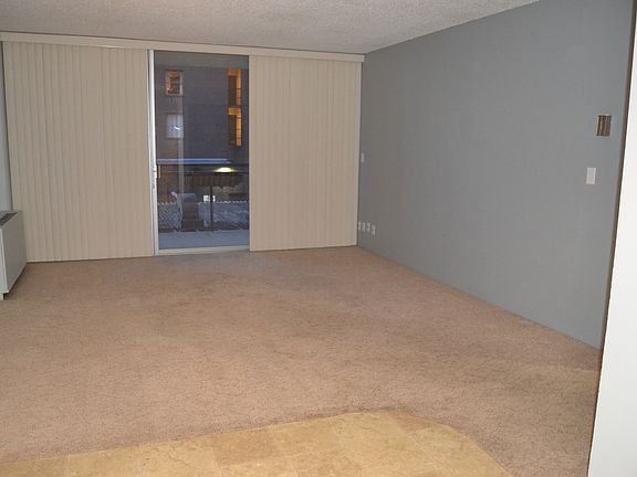 Living Room With Door To Large Lanai