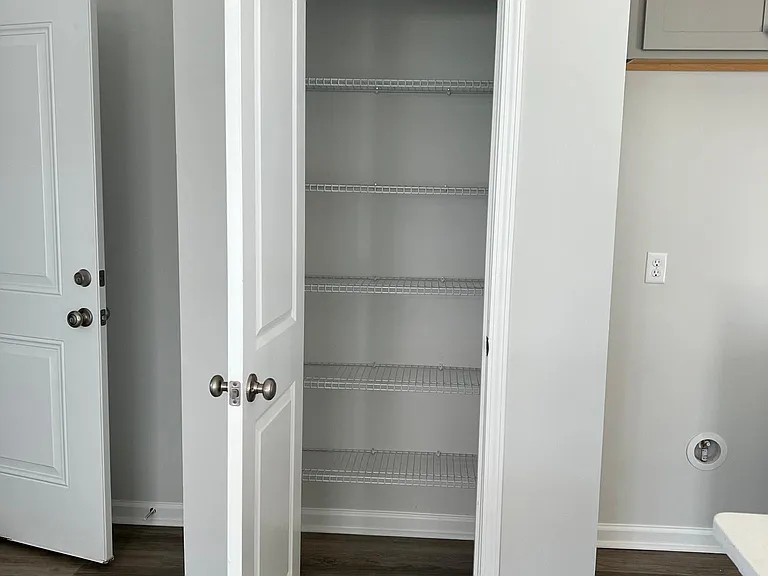 Kitchen pantry with built-in shelving