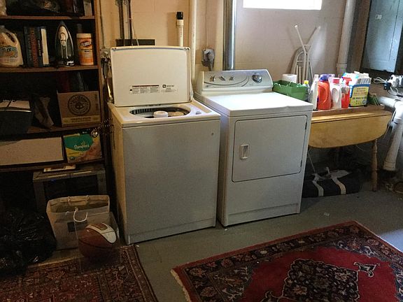 Washer and dryer in basement.