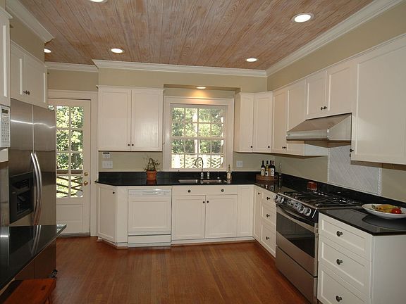 Renovated Kitchen with Granite Countertops and Stainless Steel Appliances