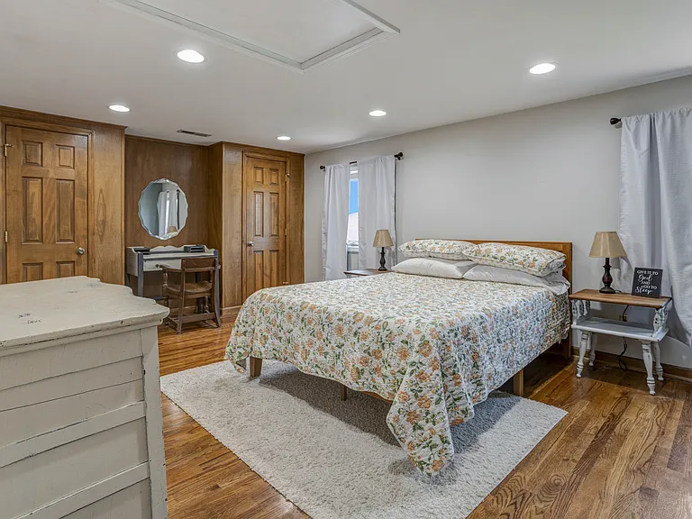 Large main bedroom with two closets.