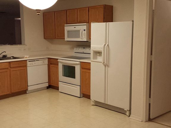 Kitchen with door way to utility room/pantry