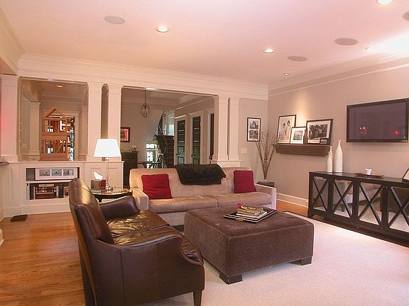 living room looking to front door/stairs