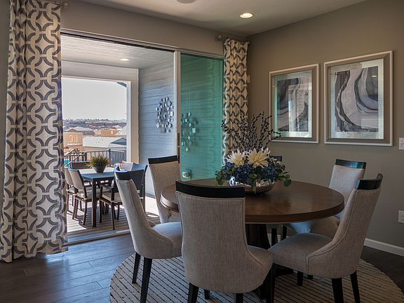 Example of Residence 4007 Dining Room and Covered Patio - Colors and finishes will vary on actual ho