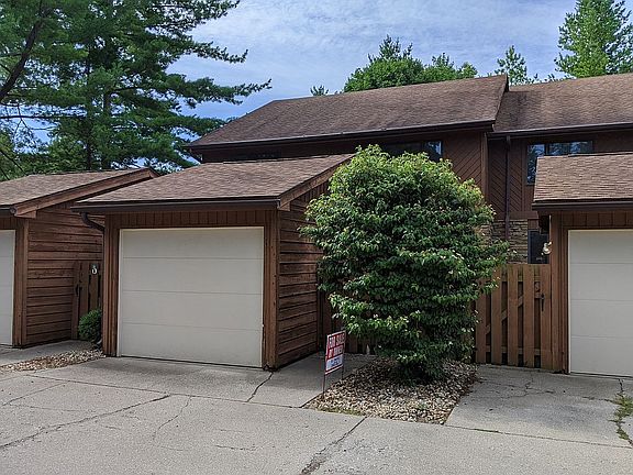 Front with gate & garage