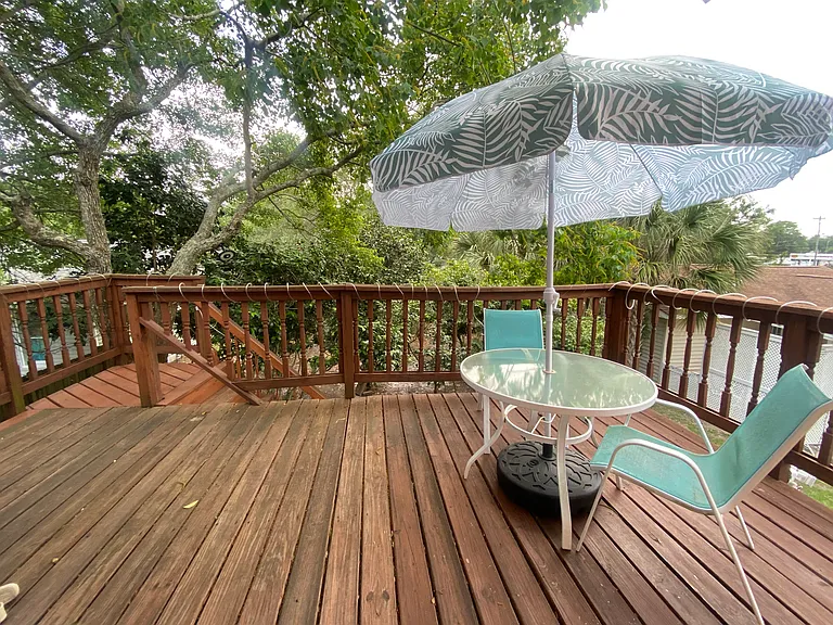 The unit has a large patio with table and chairs--it's like living in a tree house.