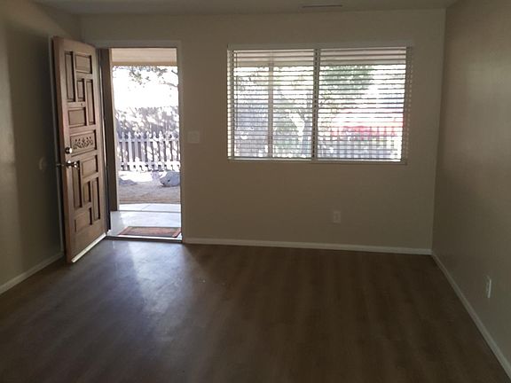 Walkout to covered porch and shaded courtyard