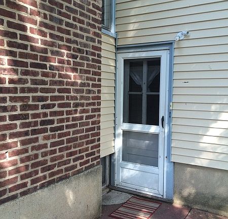 Entrance to first floor unit and basement