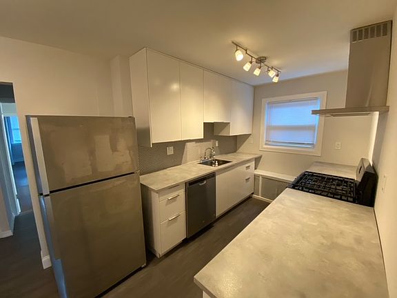 Updated kitchen with dishwasher and garbage disposal