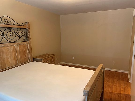 Bedroom with Queen bed and 2 night stands