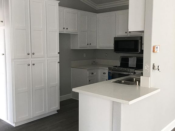 Kitchen, new cabinets countertop, sink and faucets as well