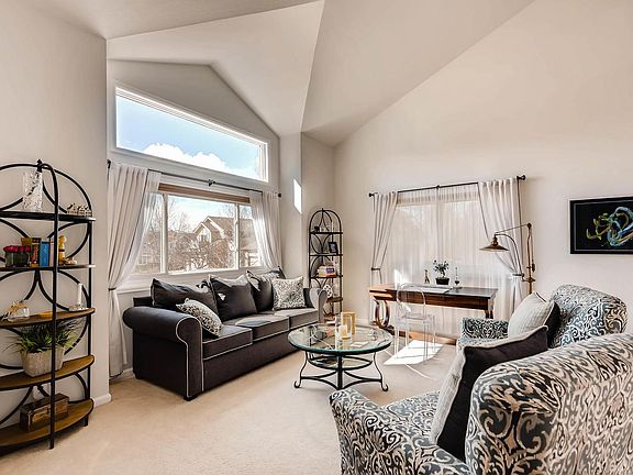 Living room with cathedral ceiling.