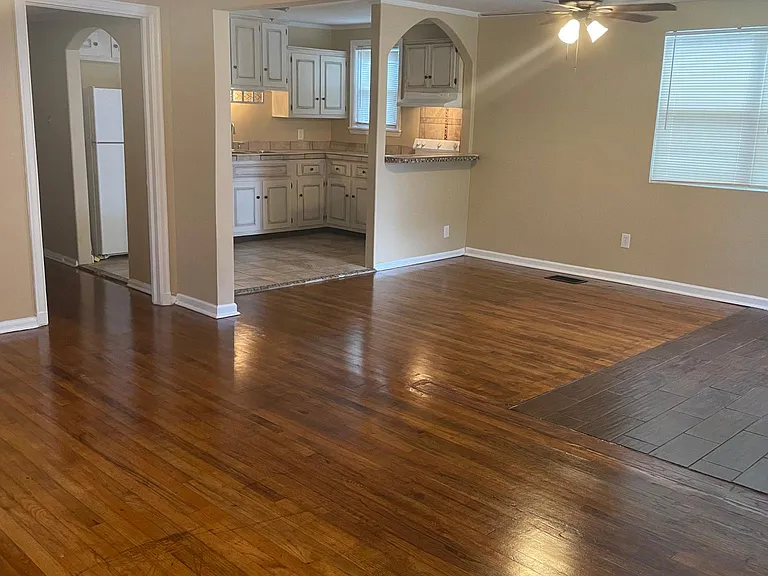 View of kitchen and dining area from living room