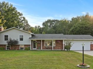 9090 Windsong Ln, Cadillac, MI 49601