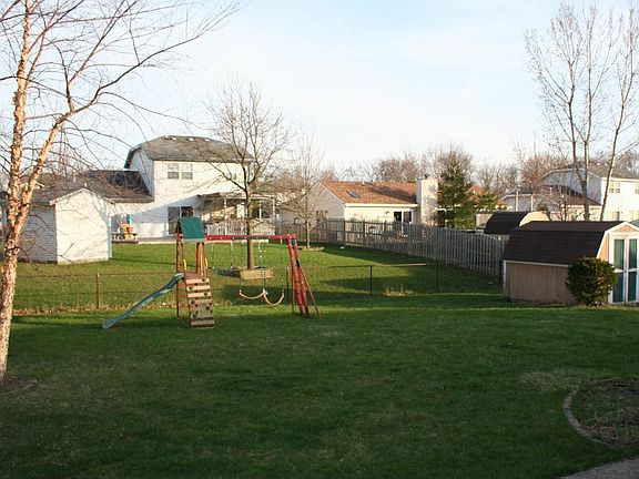 Spacious backyard with storage shed