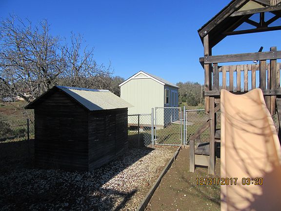 Log cabin and storage shed