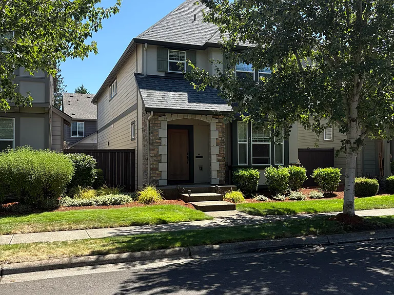 Stone with Tudor styling.