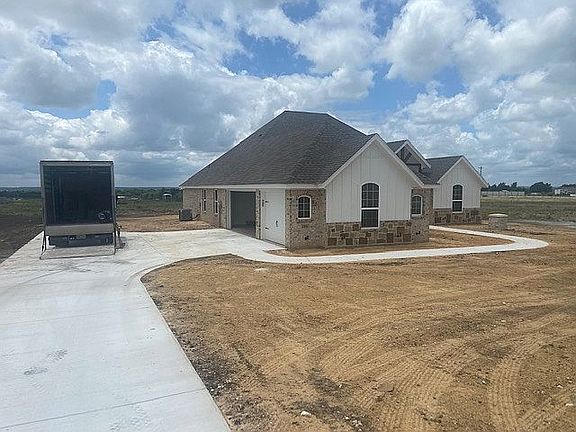 Street to garage side
