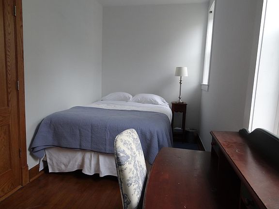 South bedroom with lots of light overlooks garden
